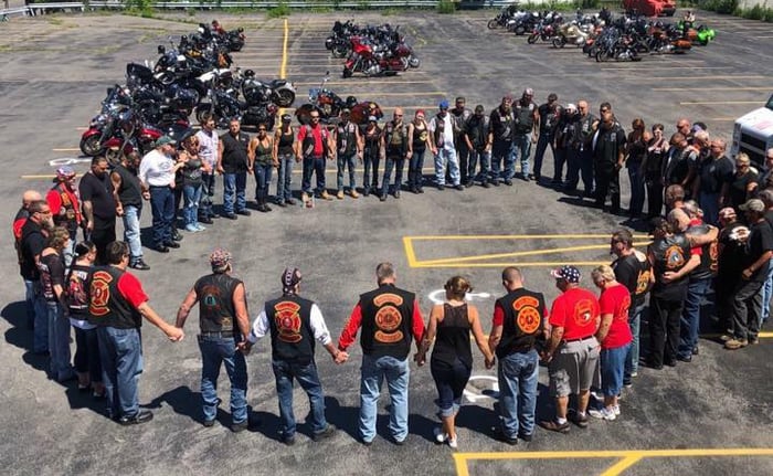 Prayer circle before charity ride