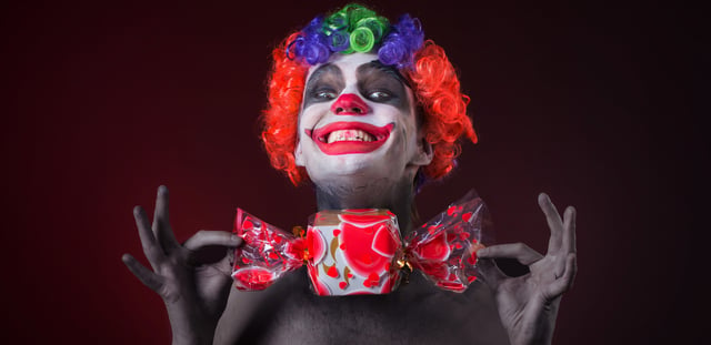 photodune-13170599-scary-clown-with-spooky-makeup-and-more-candy-l-WIDE.jpg