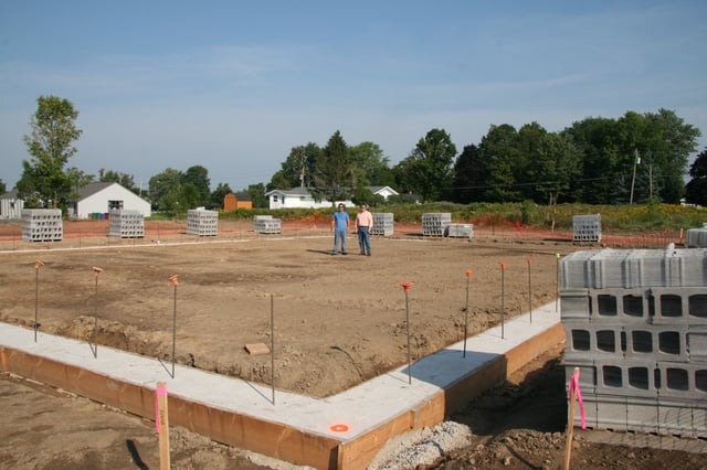 President/Owner, Phil Bova and VP of Operations, Tim Buckles stand in the construction area of the future facility on September 5, 2014.   